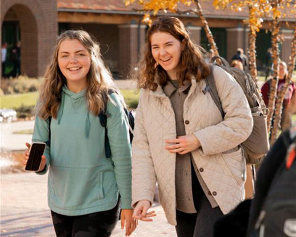 Female-Students-Walking-in-Fall